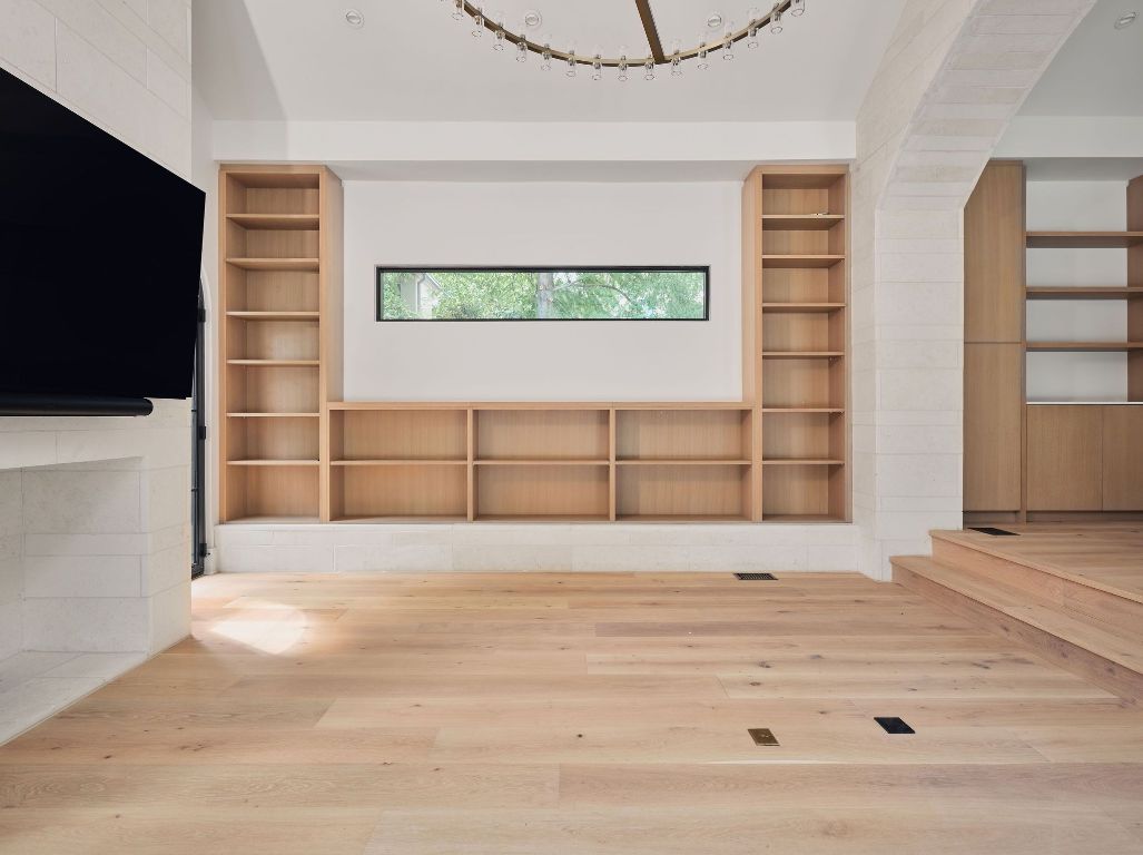 13 Niles Road Austin, TX 78703 - Photo 10 of 40 a view of wooden floor and windows in a room