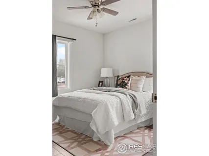 a bedroom with a bed and a cabinets