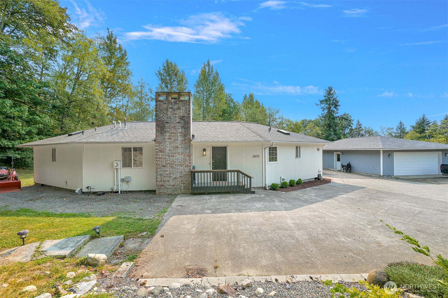 3575 Sweet Road Blaine, WA 98230 - Photo 26 of 35 a view of a house with backyard and a tree