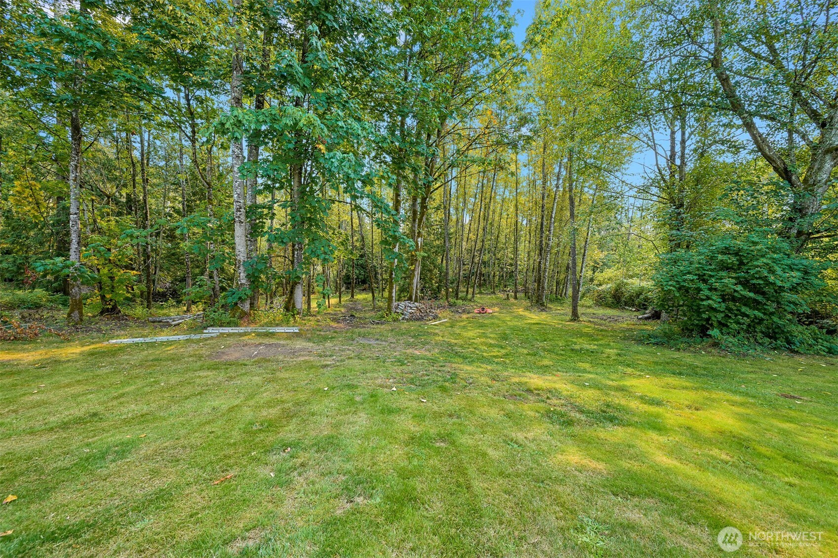3575 Sweet Road Blaine, WA 98230 - Photo 32 of 35 a view of outdoor space with trees all around