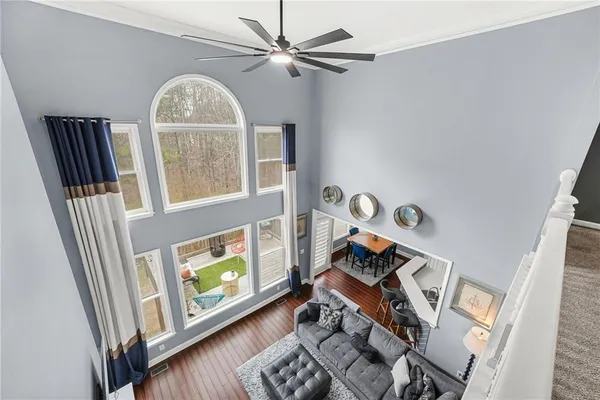 a view of living room with furniture and a window