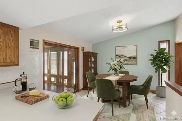 a view of a dining room with furniture
