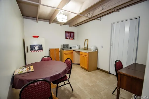 a view of a dining room with furniture