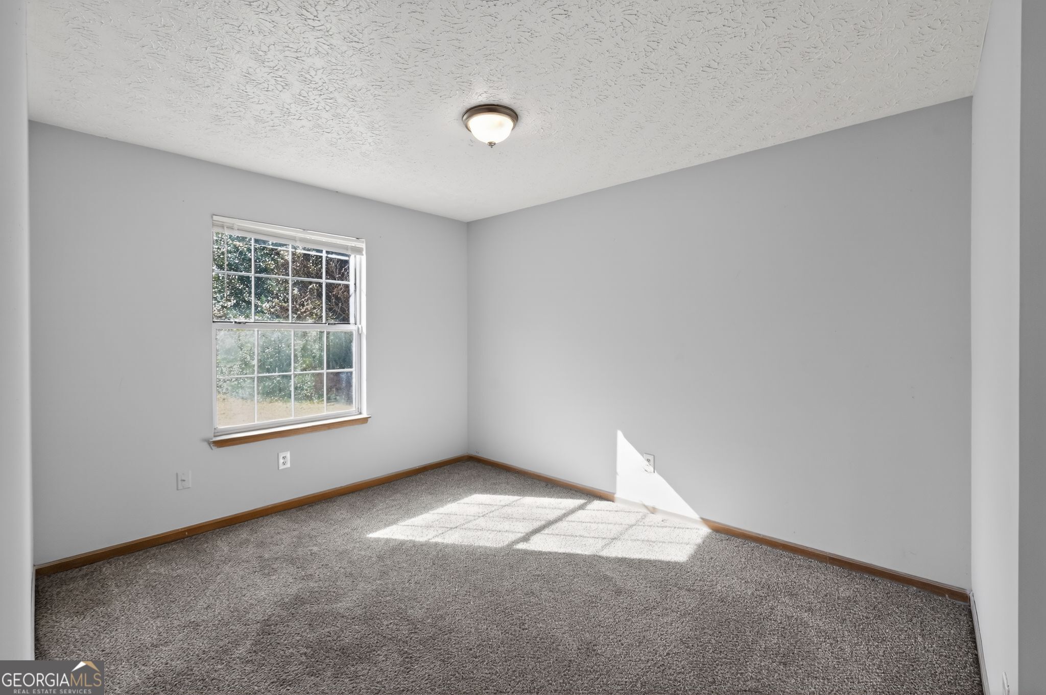 10248 Briarbay Loop Jonesboro, GA 30238 - Photo 8 of 31 an empty room with a window