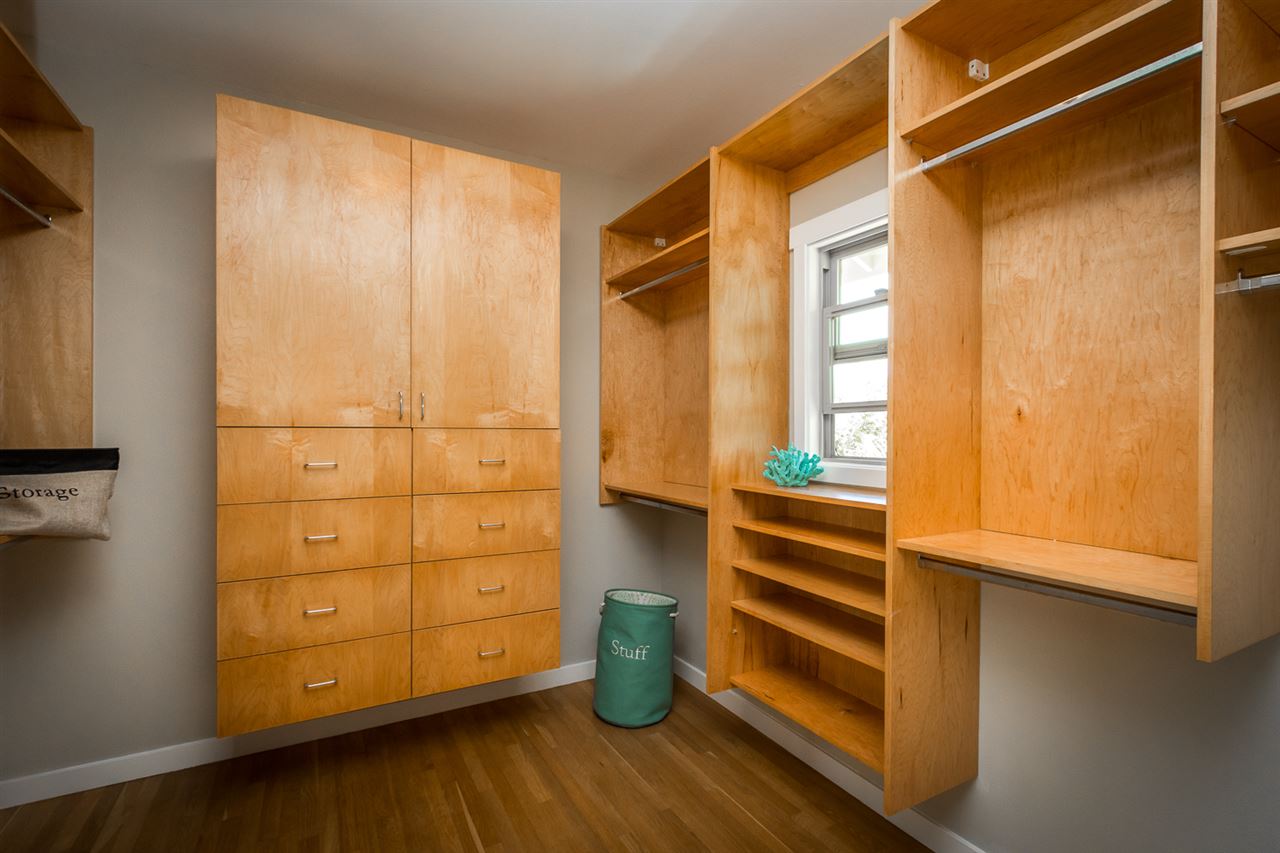 195 Mauu Place Haiku, HI 96708 - Photo 18 of 30 a room with wooden floor and windows