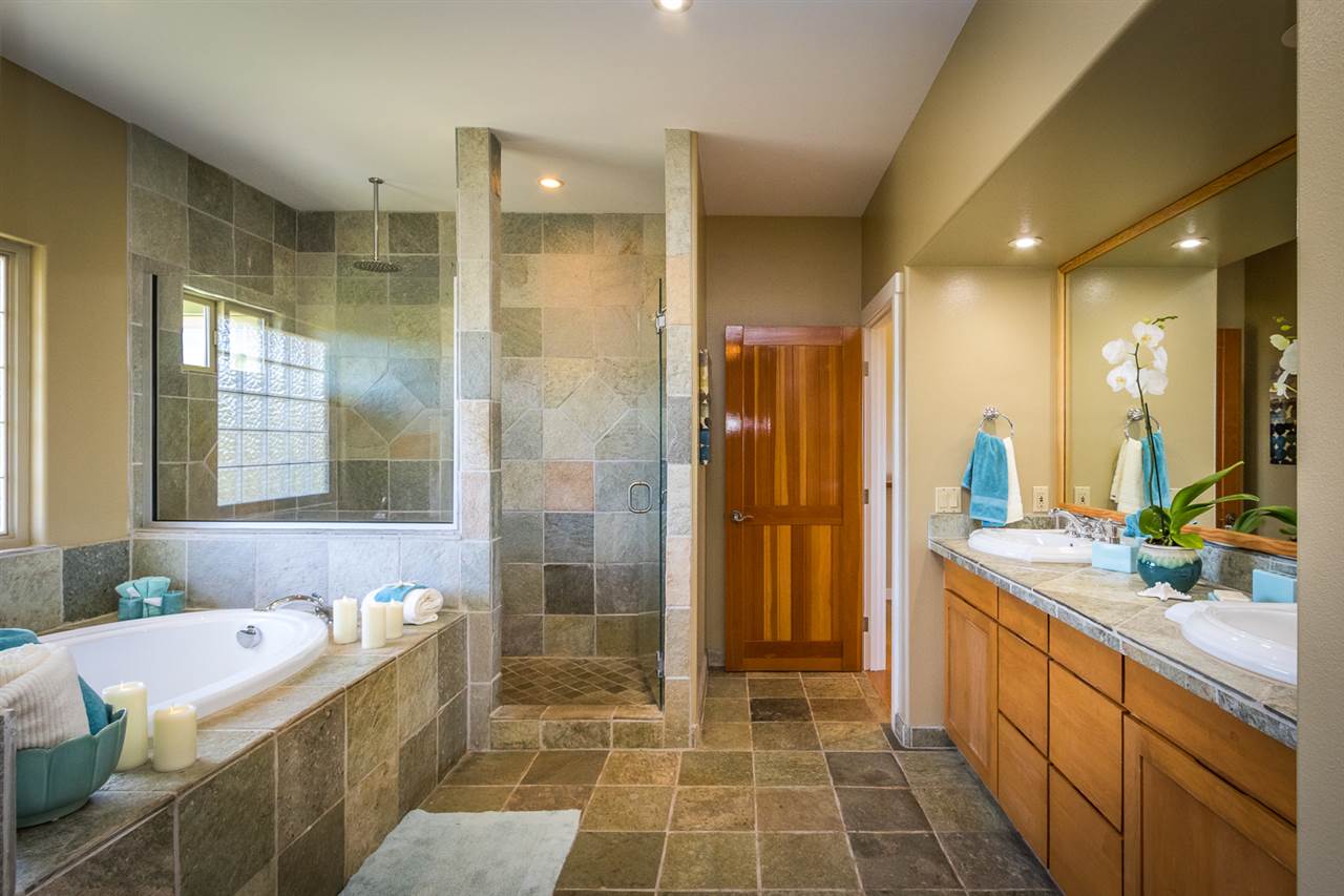 195 Mauu Place Haiku, HI 96708 - Photo 19 of 30 a bathroom with a double vanity sink mirror and shower