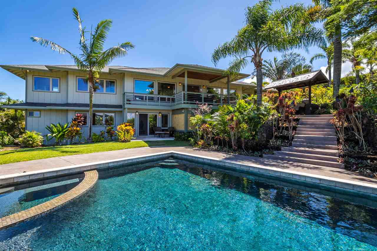 195 Mauu Place Haiku, HI 96708 - Photo 2 of 30 a view of swimming pool with a bench and wooden fence