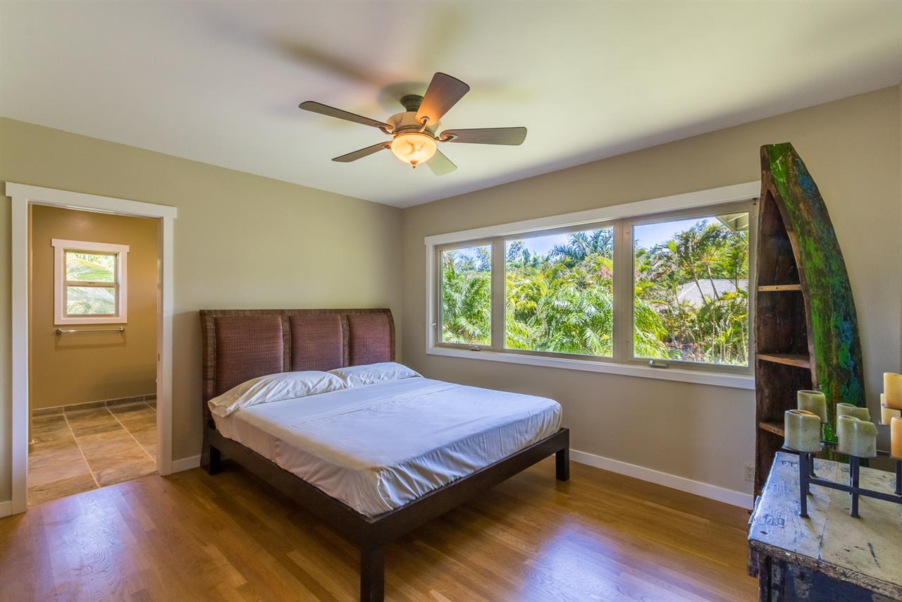 195 Mauu Place Haiku, HI 96708 - Photo 23 of 30 a bedroom with a bed and window