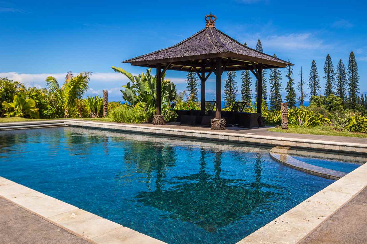 195 Mauu Place Haiku, HI 96708 - Photo 6 of 30 a view of swimming pool from a balcony