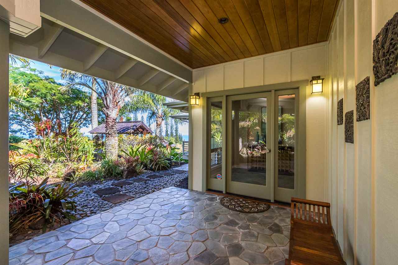 195 Mauu Place Haiku, HI 96708 - Photo 7 of 30 a view of a glass door with a porch