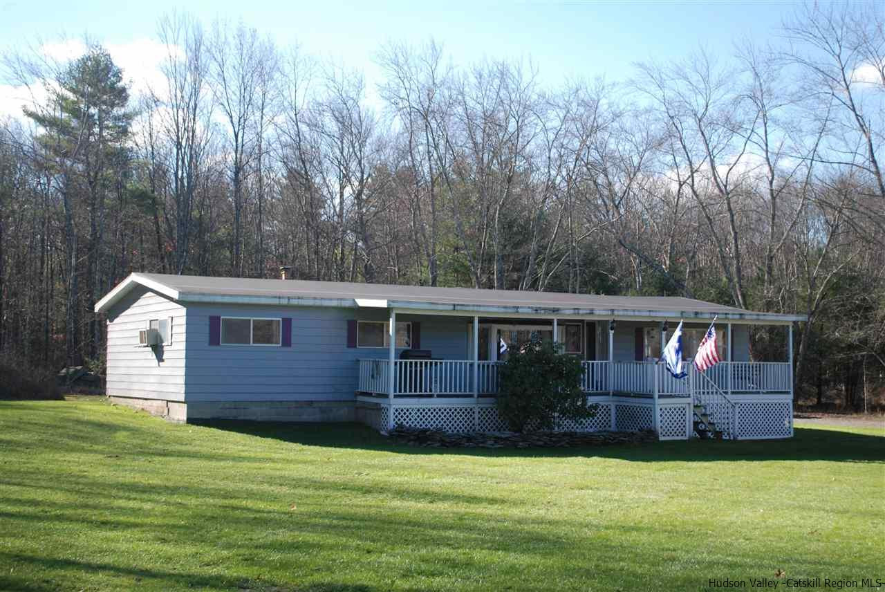 437 Scarawan Road Stone Ridge, NY 12484 - Photo 1 of 35 a view of a house with a backyard