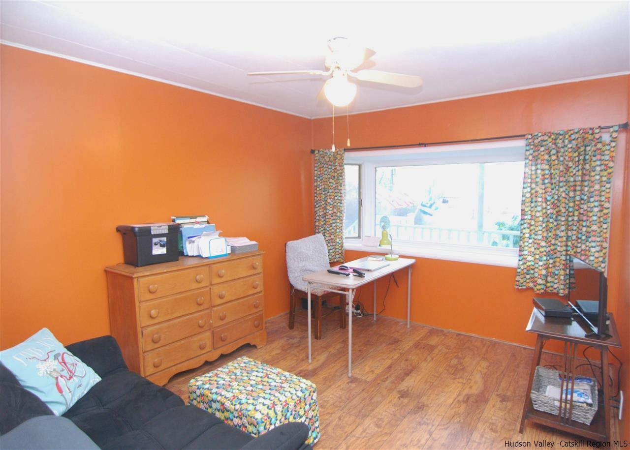 437 Scarawan Road Stone Ridge, NY 12484 - Photo 27 of 35 a room with furniture and a window