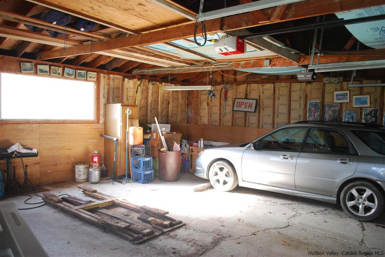 437 Scarawan Road Stone Ridge, NY 12484 - Photo 33 of 35 a car parked in a garage
