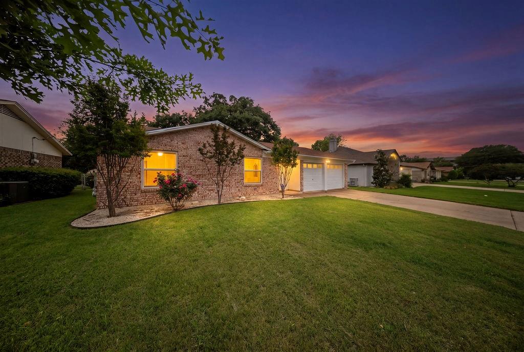 a view of a house with a big yard
