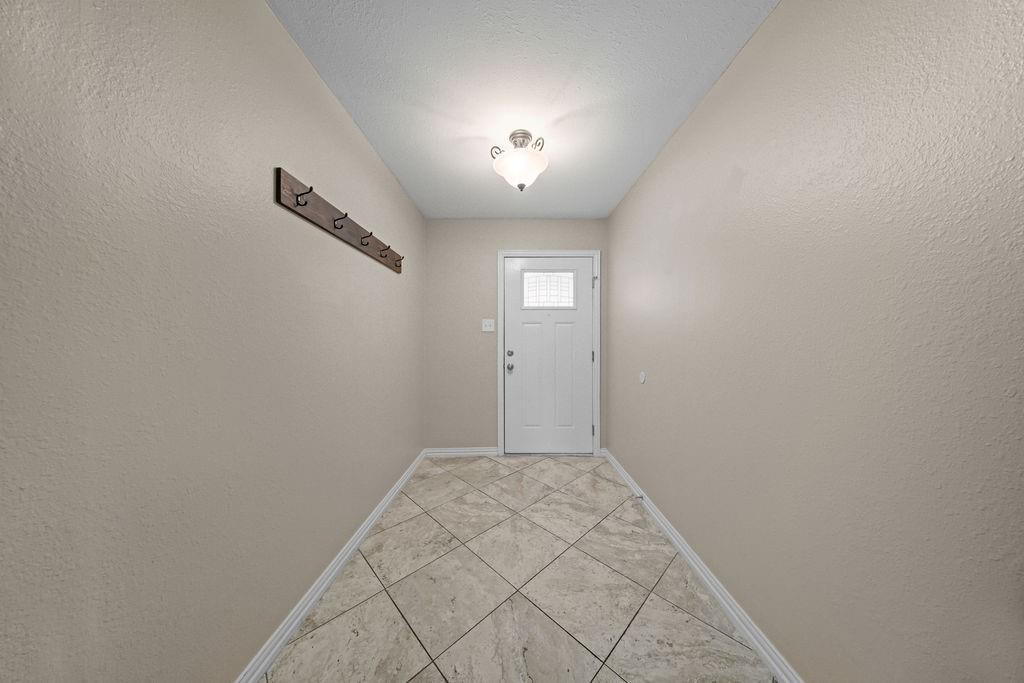 1041 Barber Street Hurst, TX 76053 - Photo 11 of 36 a view of an empty room