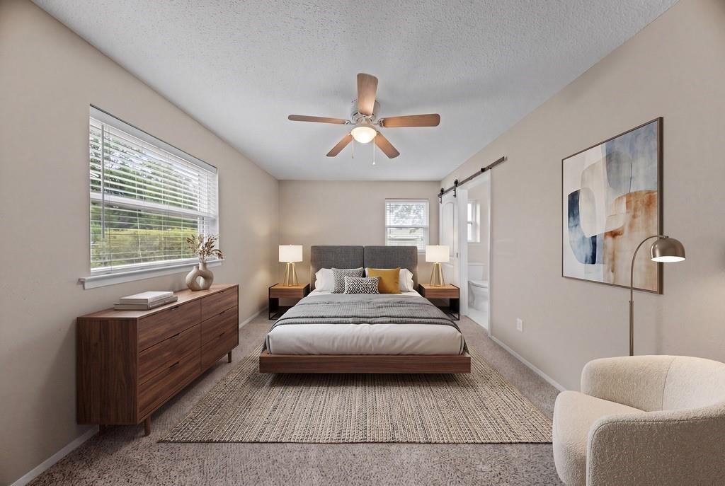 1041 Barber Street Hurst, TX 76053 - Photo 16 of 36 a bedroom with a bed and window