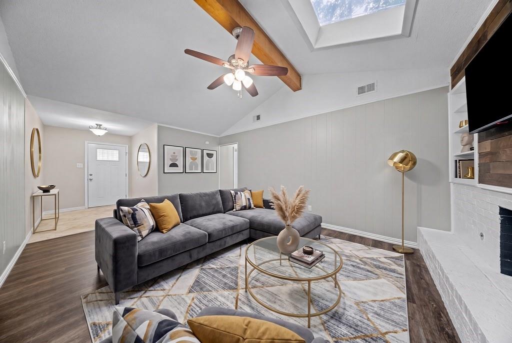 1041 Barber Street Hurst, TX 76053 - Photo 3 of 36 a living room with furniture and a flat screen tv