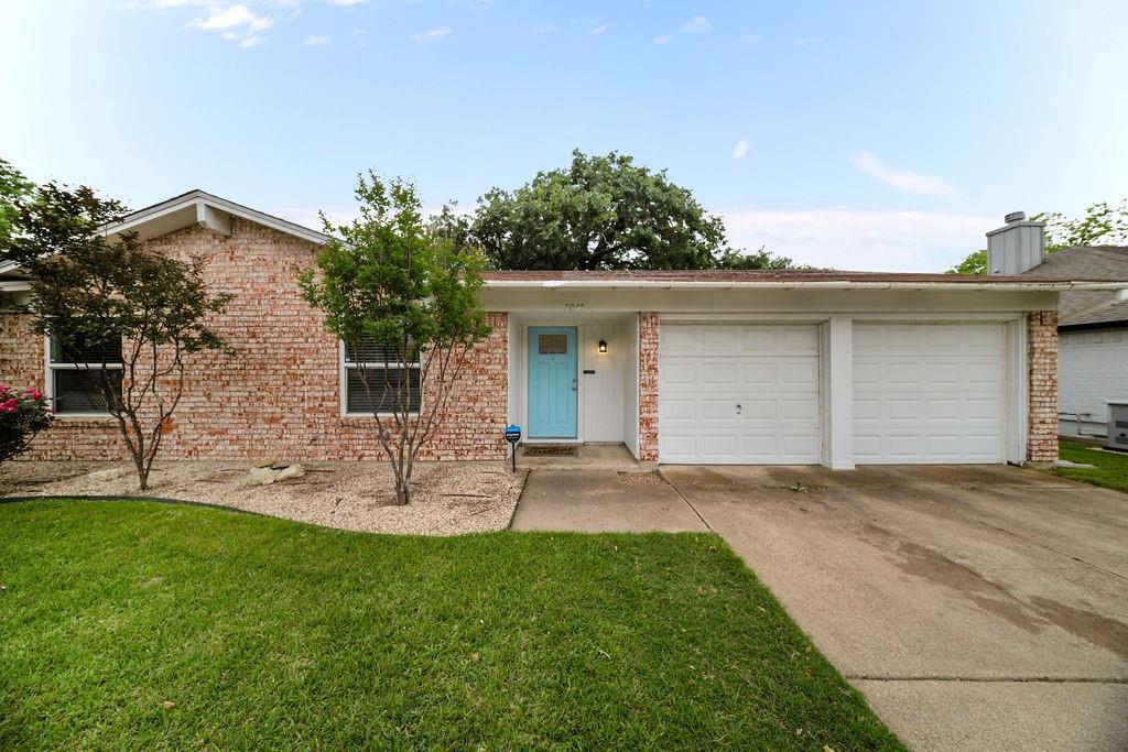 1041 Barber Street Hurst, TX 76053 - Photo 34 of 36 a view of a backyard with table and chairs and potted plants