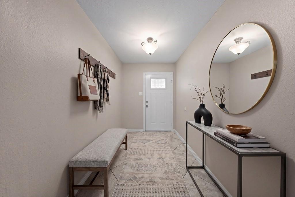 1041 Barber Street Hurst, TX 76053 - Photo 10 of 36 a very nice looking room with a mirror