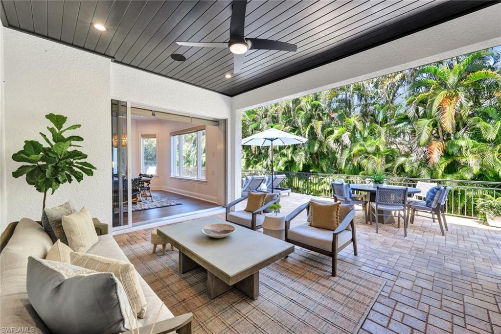 445 Putter Point Drive Naples, FL 34103 - Photo 37 of 44 a outdoor space with furniture