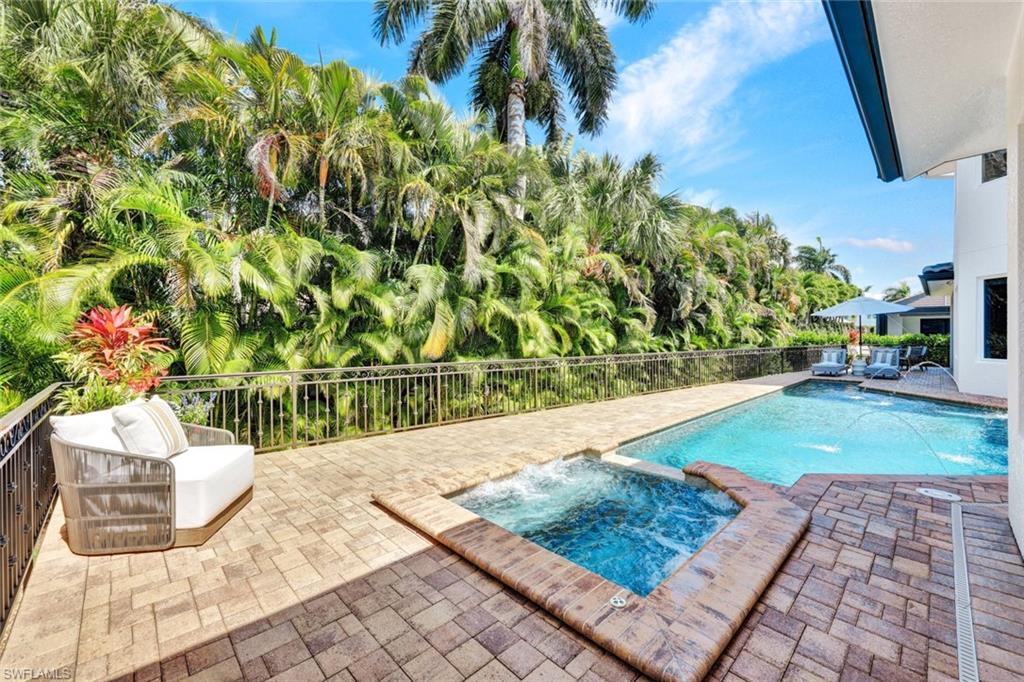 445 Putter Point Drive Naples, FL 34103 - Photo 40 of 44 a view of an outdoor space