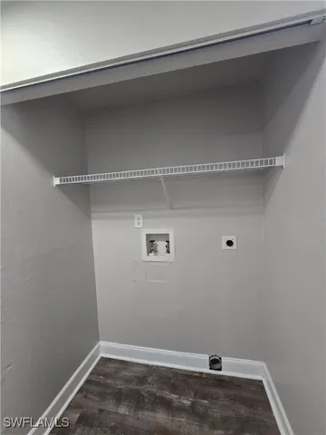 a view of a room with racks on the wall