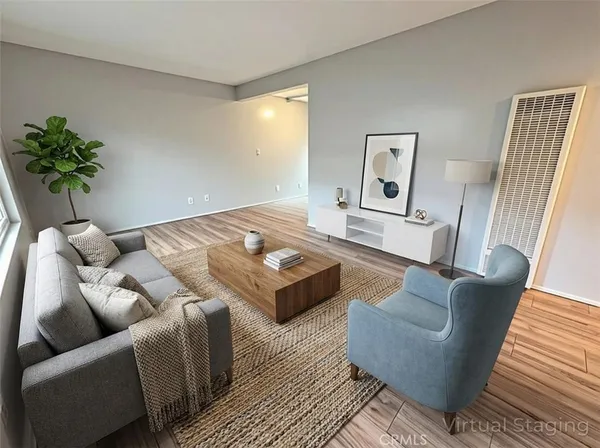 a bedroom with furniture and a couch