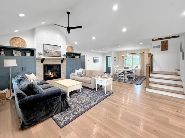 a kitchen with kitchen island granite countertop lots of counter top space and stainless steel appliances