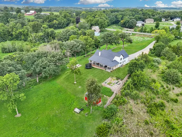 an aerial view of residential house with outdoor space