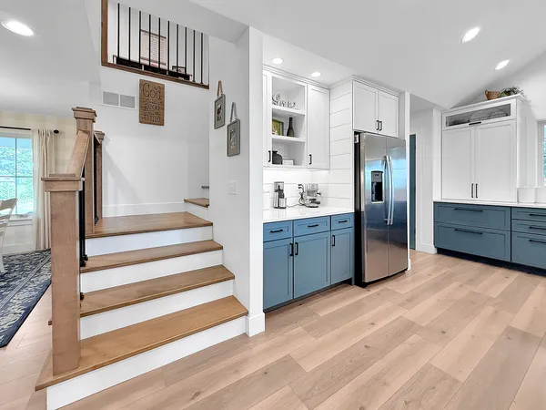 a bathroom with a bathtub and window