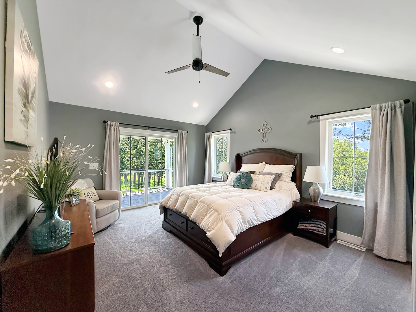 4567 West Stephenson St Road Freeport, IL 61032 - Photo 27 of 65 a large bedroom with a large bed and a potted plant