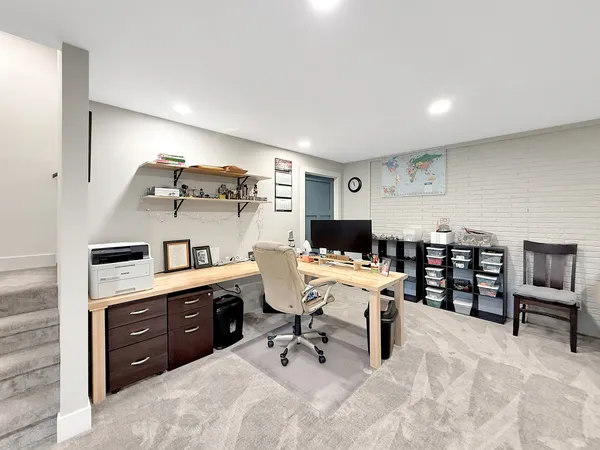 a view of a hallway with workspace