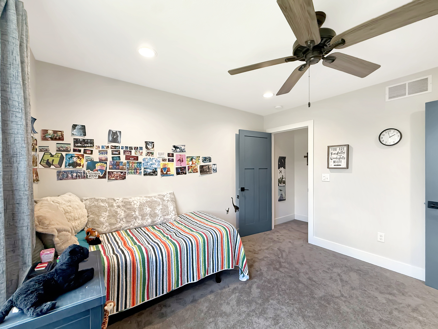 4567 West Stephenson St Road Freeport, IL 61032 - Photo 57 of 65 a bedroom with a bed and a ceiling fan