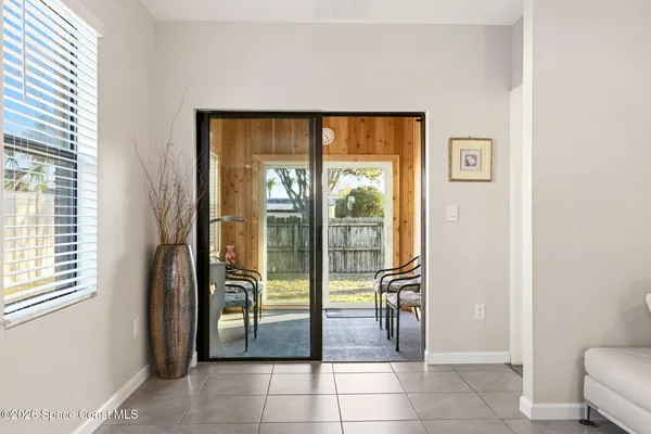 a view of a hallway with bathroom