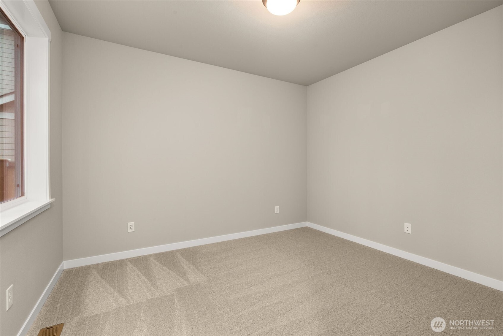 5654 Mimi Street Southwest Tumwater, WA 98512 - Photo 12 of 38 a view of an empty room