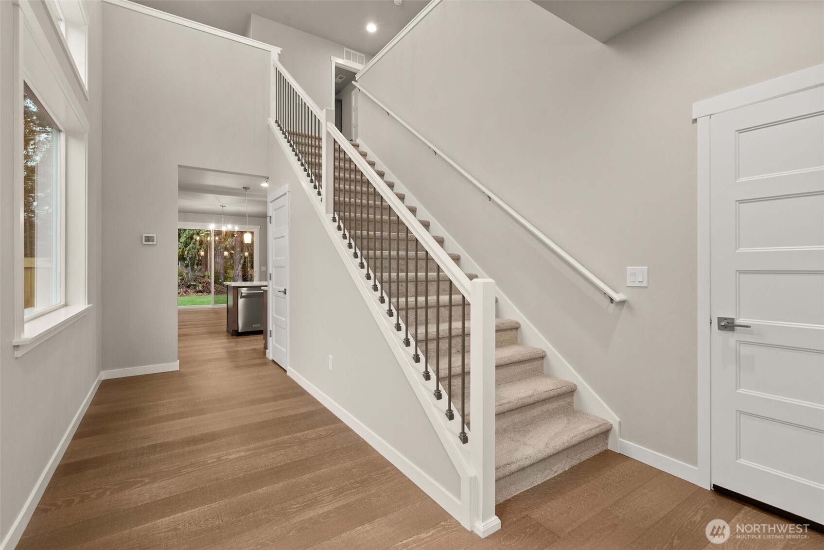 5654 Mimi Street Southwest Tumwater, WA 98512 - Photo 15 of 38 a view of entryway and hall with wooden floor