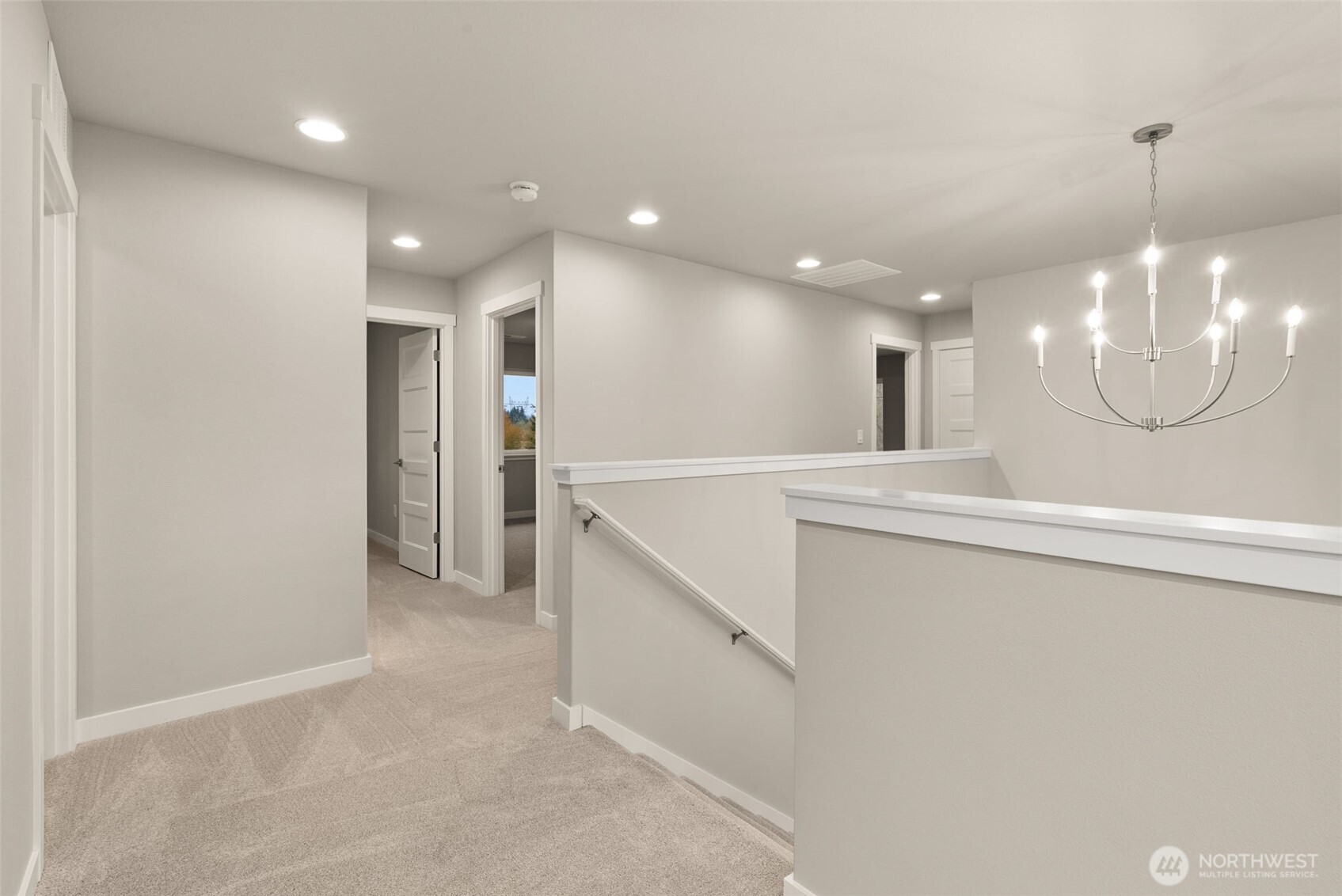 5654 Mimi Street Southwest Tumwater, WA 98512 - Photo 16 of 38 a bathroom with a sink a large mirror and a shower