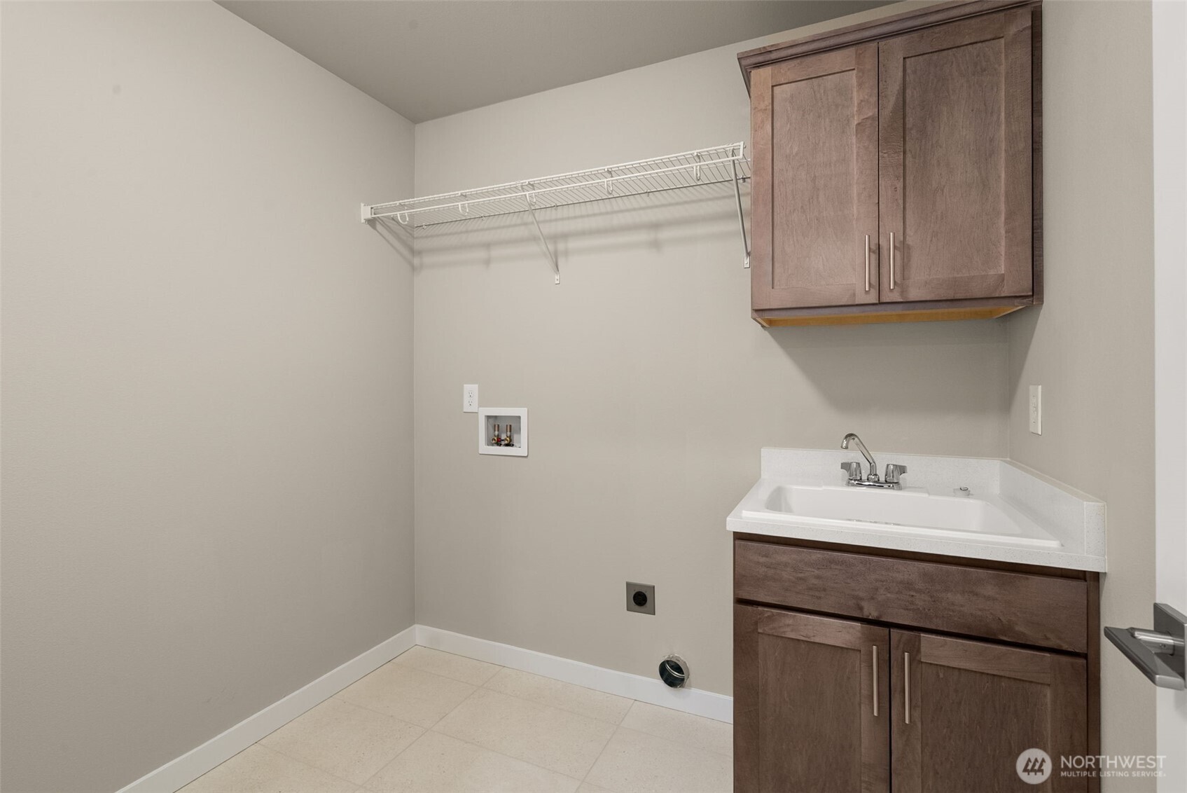 5654 Mimi Street Southwest Tumwater, WA 98512 - Photo 24 of 38 a bathroom with a sink and a mirror