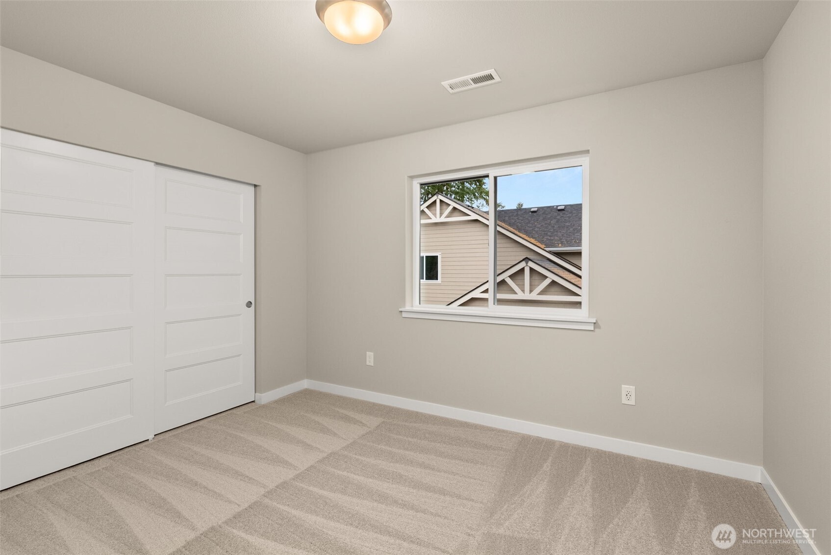 5654 Mimi Street Southwest Tumwater, WA 98512 - Photo 26 of 38 an empty room with windows