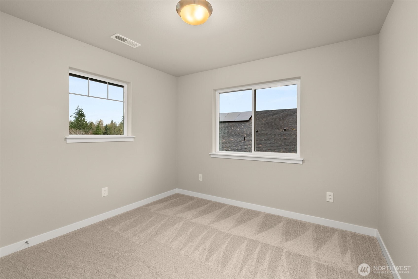 5654 Mimi Street Southwest Tumwater, WA 98512 - Photo 28 of 38 an empty room with a window