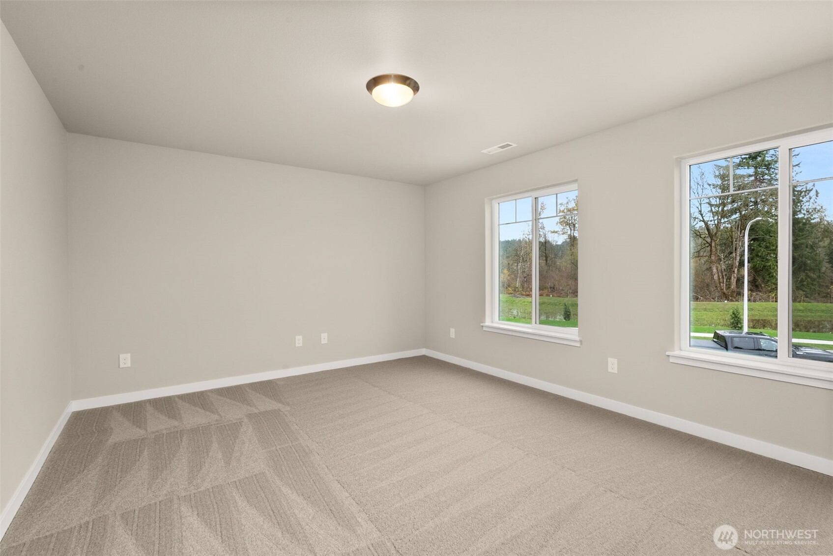 5654 Mimi Street Southwest Tumwater, WA 98512 - Photo 29 of 38 a view of an empty room with a window