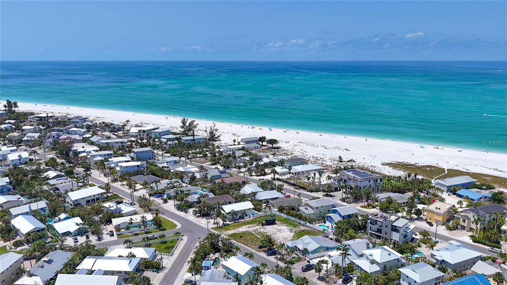 777 Jacaranda Road Anna Maria, FL 34216 - Photo 20 of 30 a view of a large body of water with a building in the background