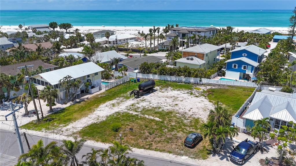 777 Jacaranda Road Anna Maria, FL 34216 - Photo 2 of 30 a view of a city with lawn chairs