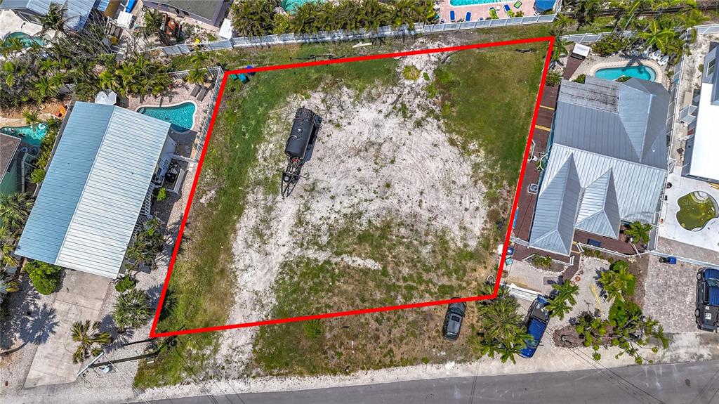 777 Jacaranda Road Anna Maria, FL 34216 - Photo 4 of 30 a view of street along with trees