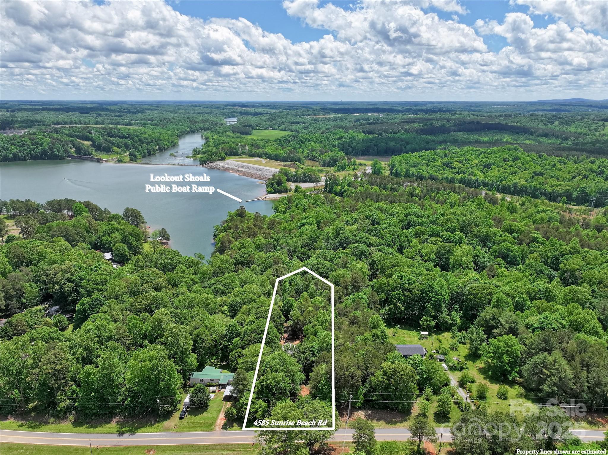 a view of a pathway with a yard