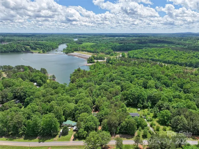 a view of a yard with an outdoor seating