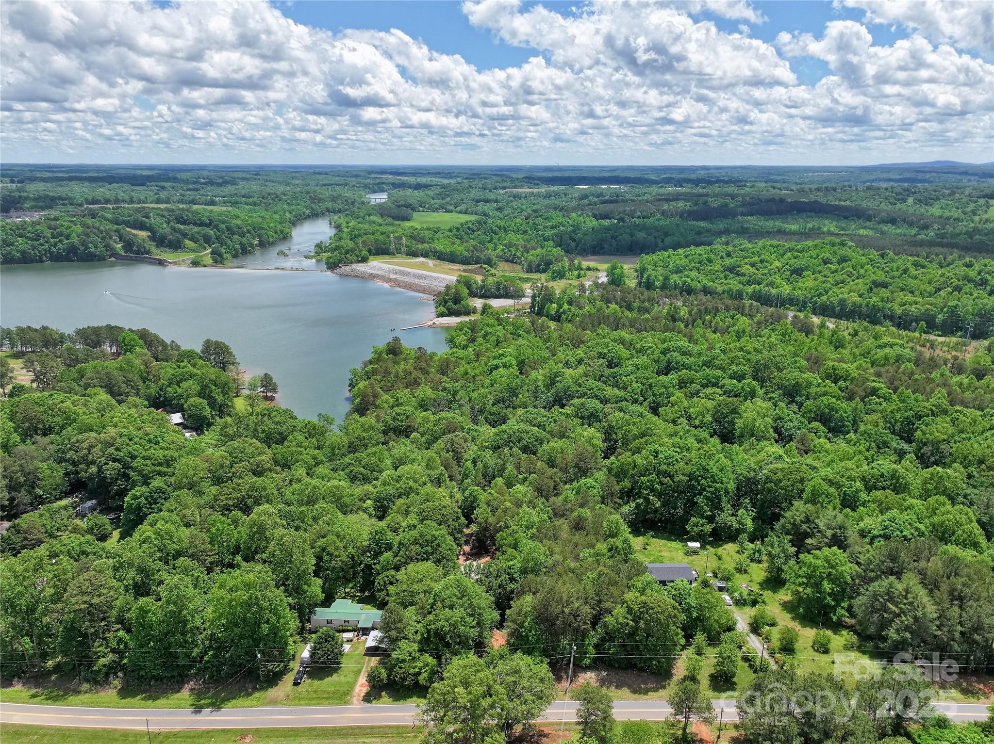4585 Sunrise Beach Road Catawba, NC 28609 - Photo 14 of 32 a view of a yard with an outdoor seating