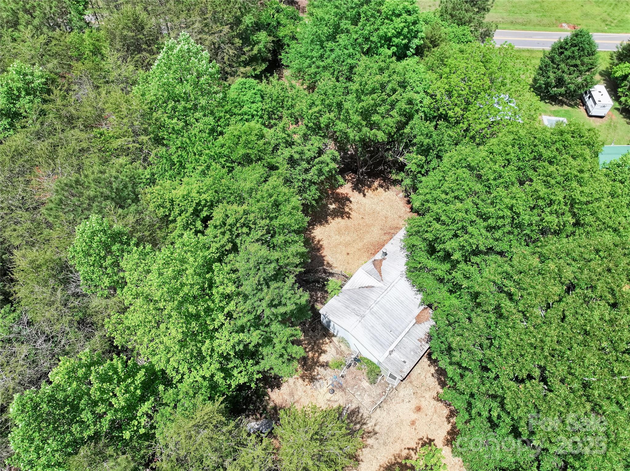 4585 Sunrise Beach Road Catawba, NC 28609 - Photo 29 of 32 an aerial view of a house with a yard and lake view