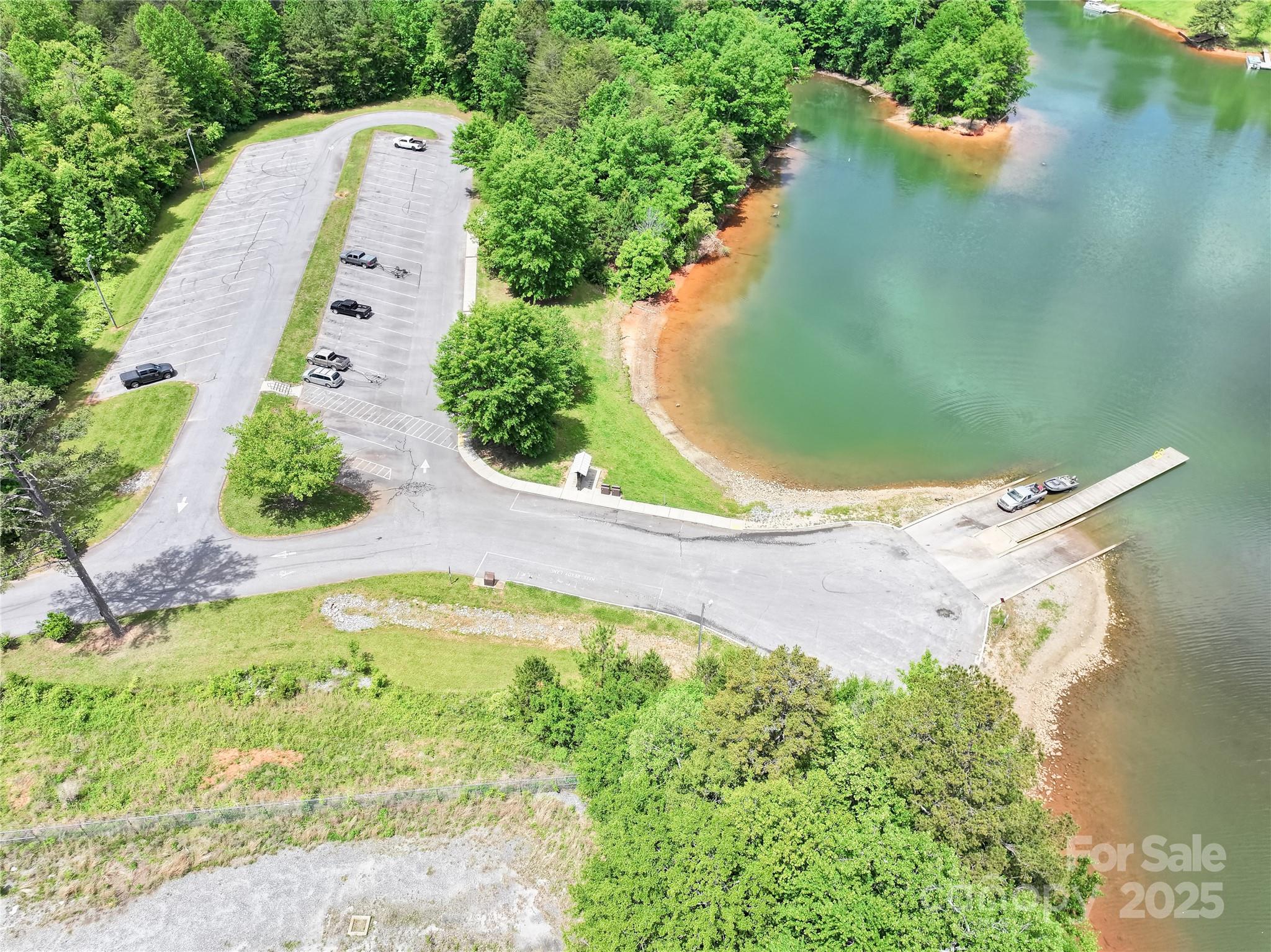 4585 Sunrise Beach Road Catawba, NC 28609 - Photo 30 of 32 an aerial view of a house with a yard and a lake view
