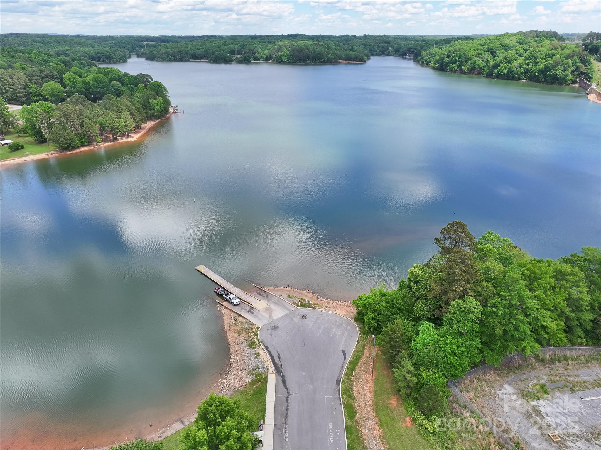 4585 Sunrise Beach Road Catawba, NC 28609 - Photo 8 of 32 a view of a lake in middle of a field